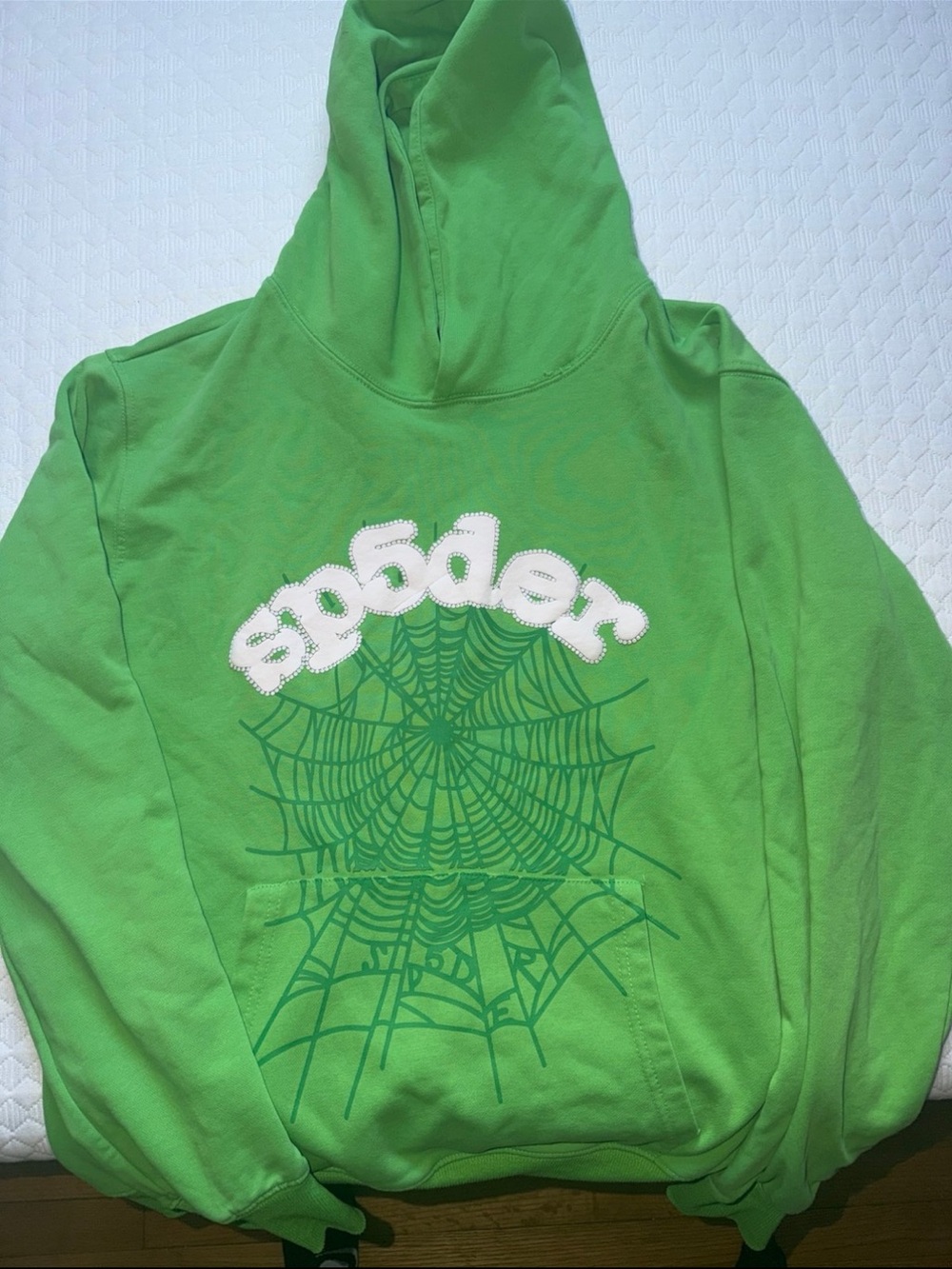 Sp5der Web Hoodie 'Slime Green' featuring a prominent white and green